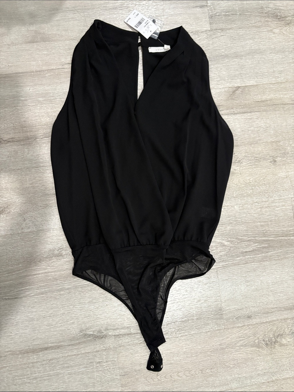 Lush Black Sleeveless Wrap-Front One-Piece Bodysuit